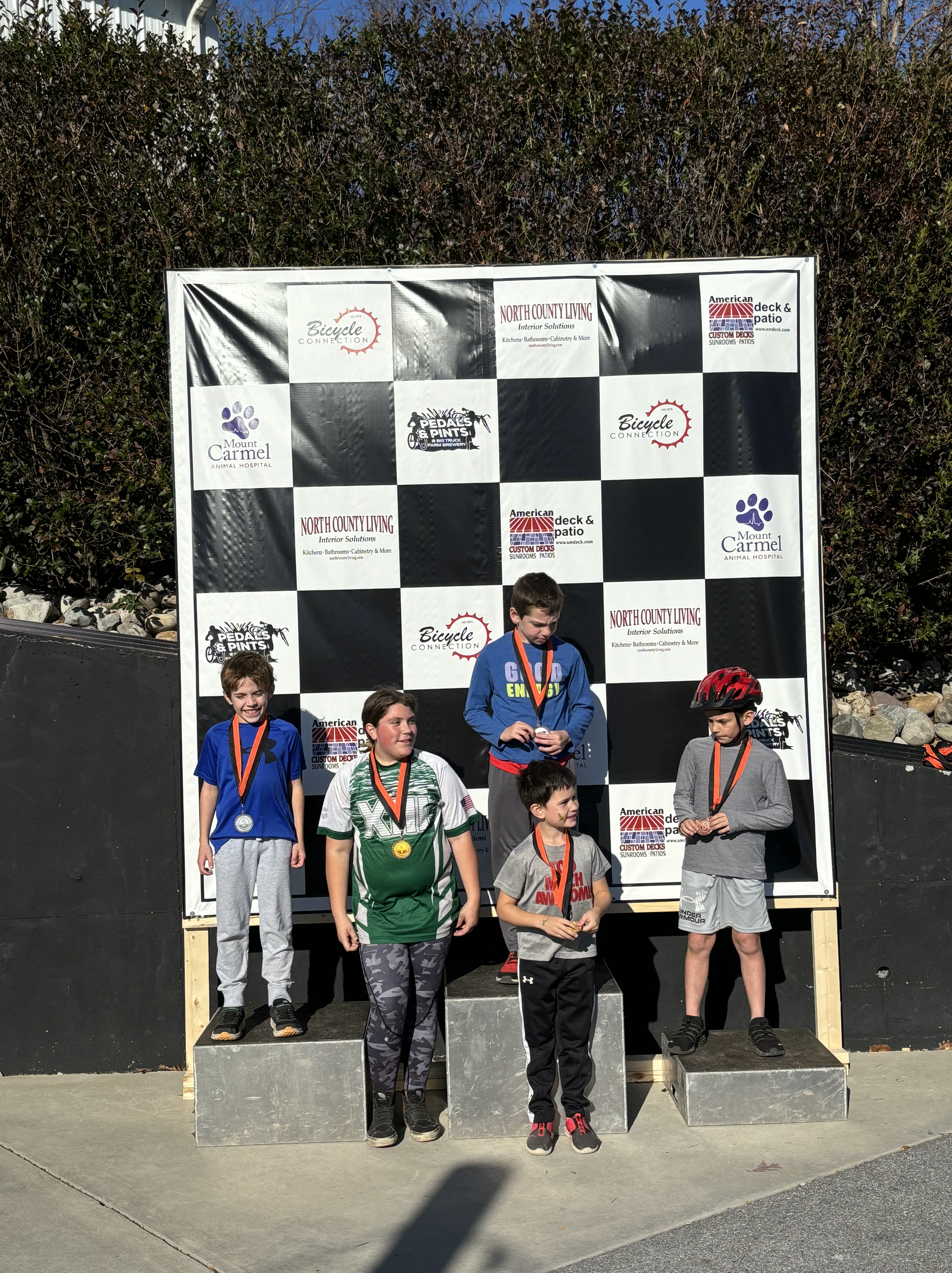 Junior cyclists receiving their awards